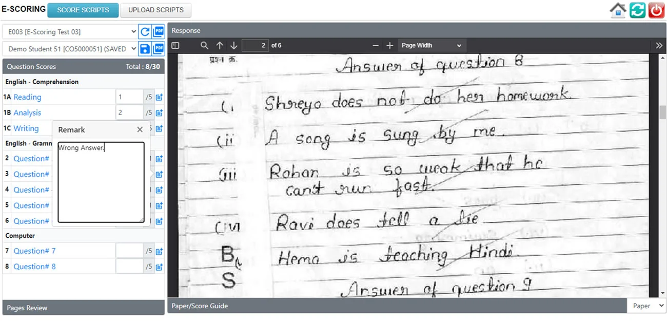 Examiner using on-screen manual scoring tool to mark candidate responses Examiner using on-screen manual scoring tool to mark candidate responses